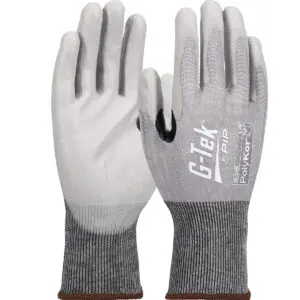 PIP G-Tek® PolyKor® Seamless Knit A4 PolyKor® Blended Glove with Polyurethane Coated Flat Grip on Palm & Fingers - 18 Gauge - Touchscreen