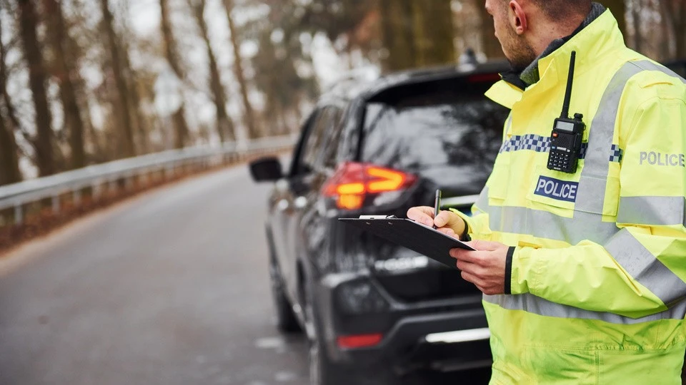 Police officer filling out report